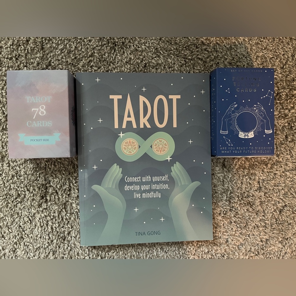 Tarot card set with tarot book on every card